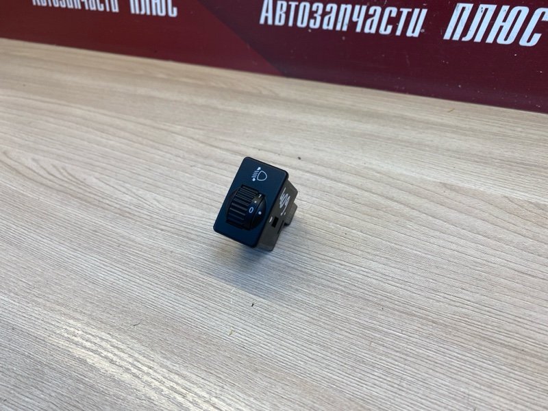 Кнопка корректора фар