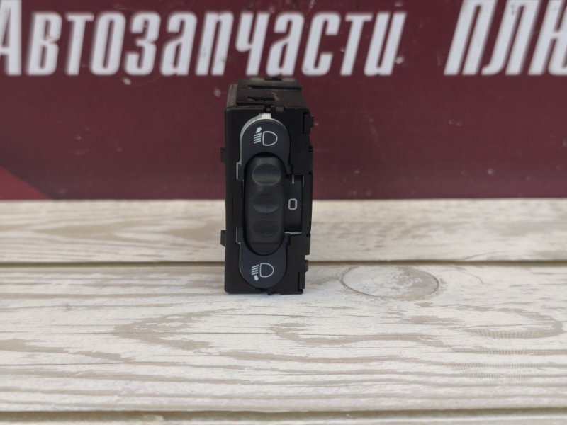 Кнопка корректора фар