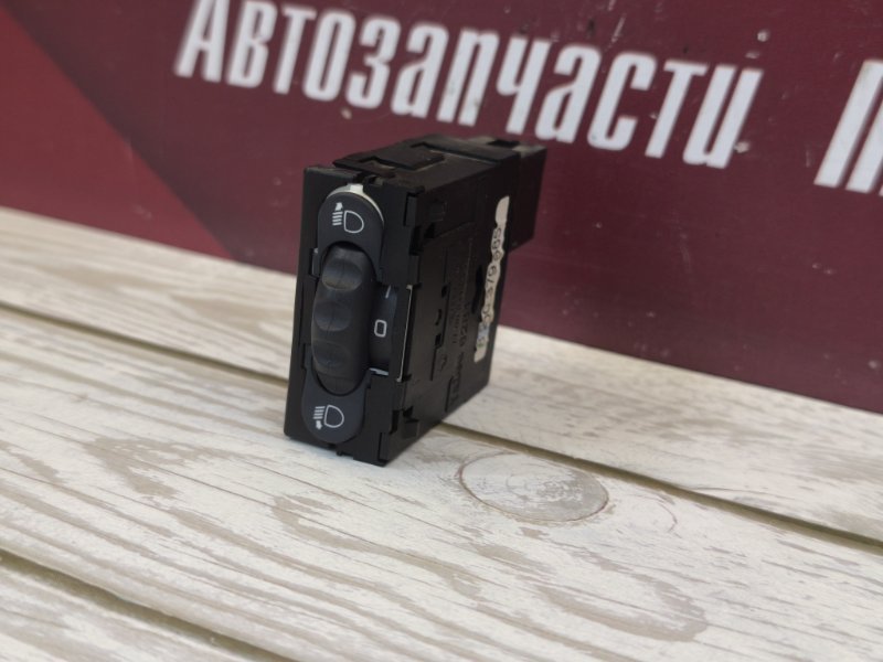 Кнопка корректора фар