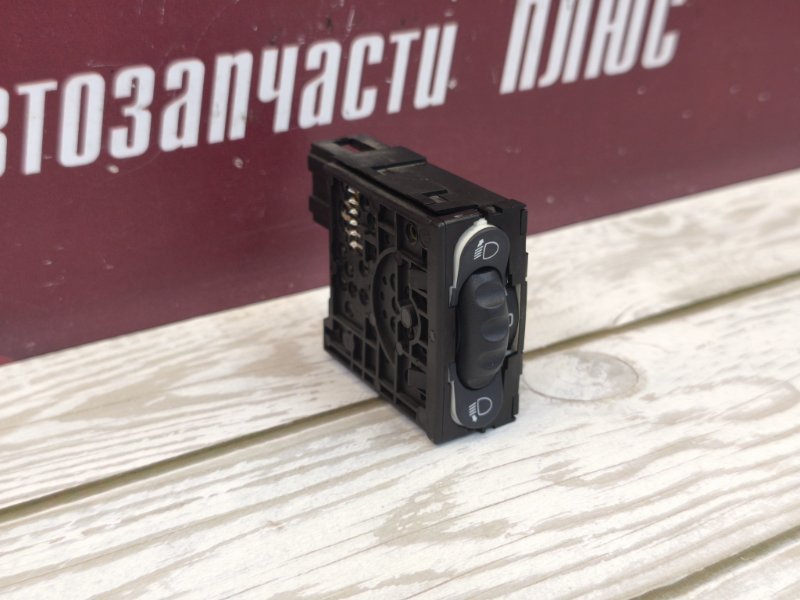 Кнопка корректора фар