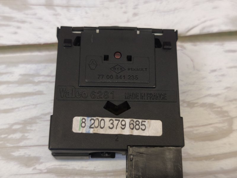 Кнопка корректора фар