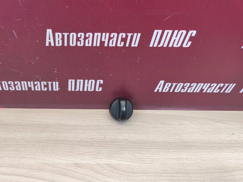 Кнопка корректора фар