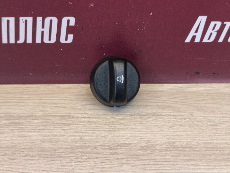 Кнопка корректора фар