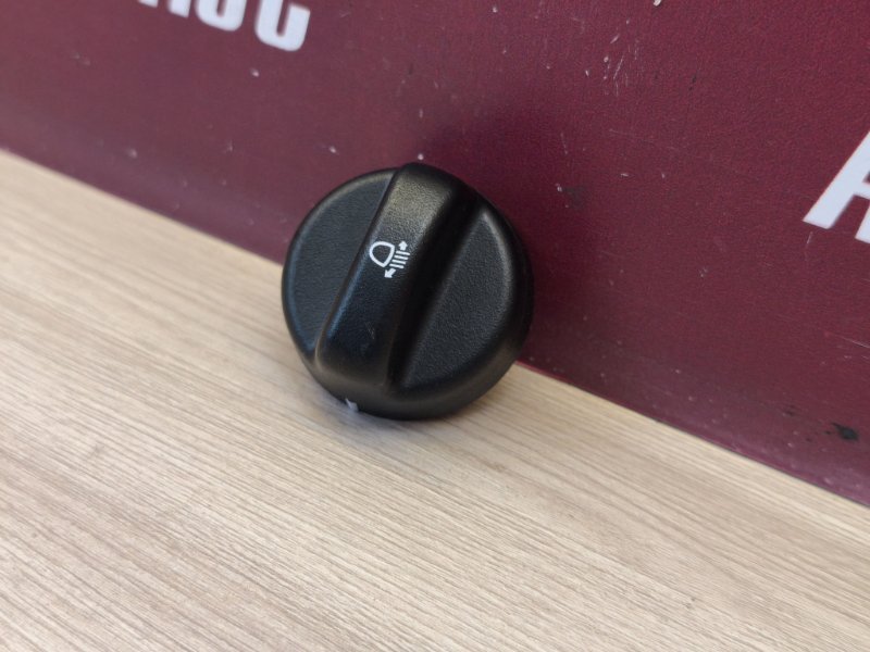 Кнопка корректора фар