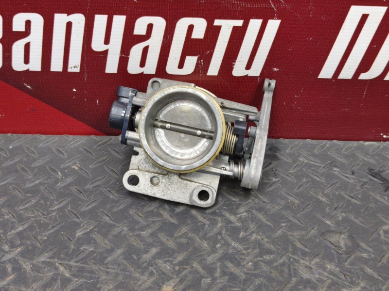 Дроссельная заслонка