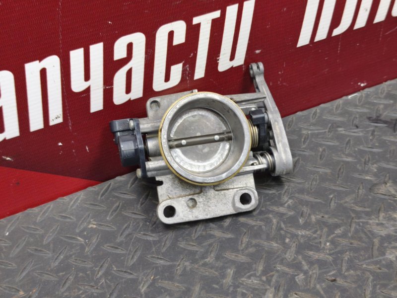 Дроссельная заслонка